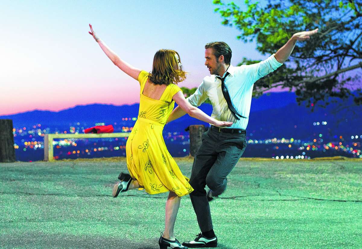 Ryan Gosling, right, and Emma Stone in a scene from, "La La Land." 