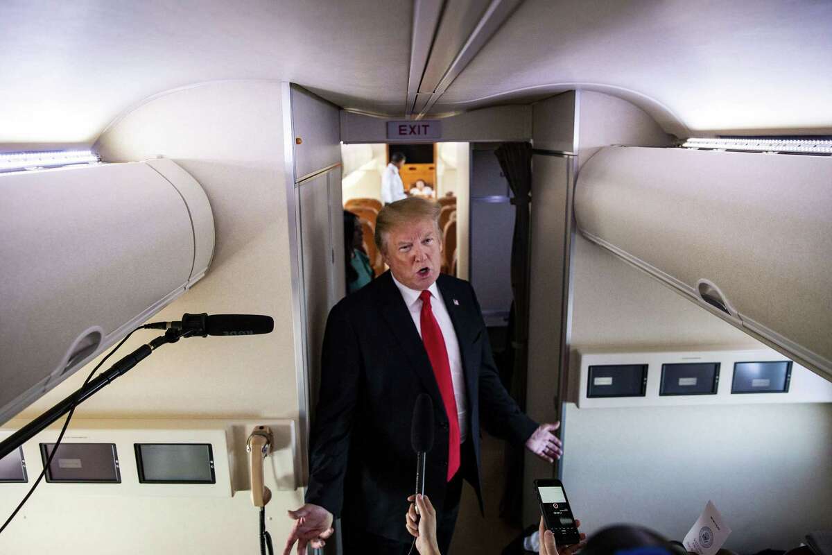 President Donald Trump speaks to reporters aboard Air Force One in 2018. Trump said then he was pressuring Saudi Arabia and OPEC to increase oil production. He’s still trying to lower oil prices. And maybe it’s working.