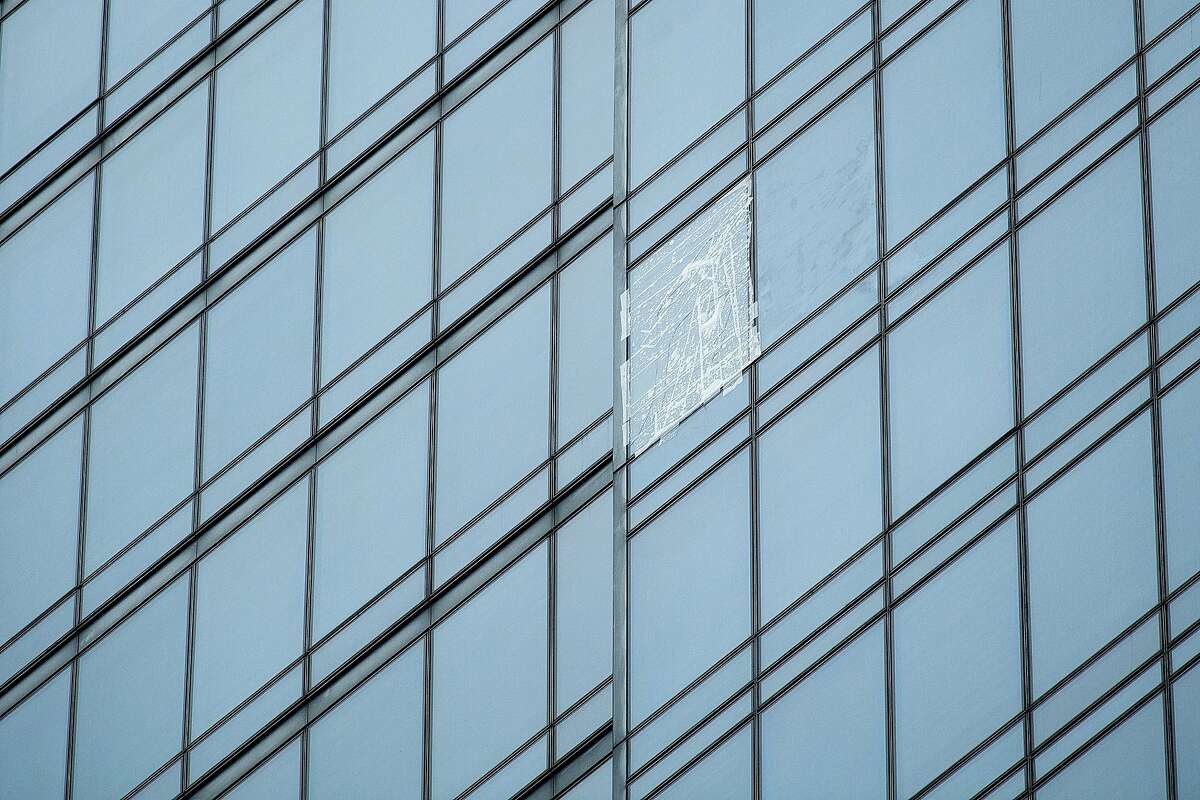 A covered up window is pictured at the Millennium Tower on Tuesday, Sept. 25, 2018, in San Francisco.