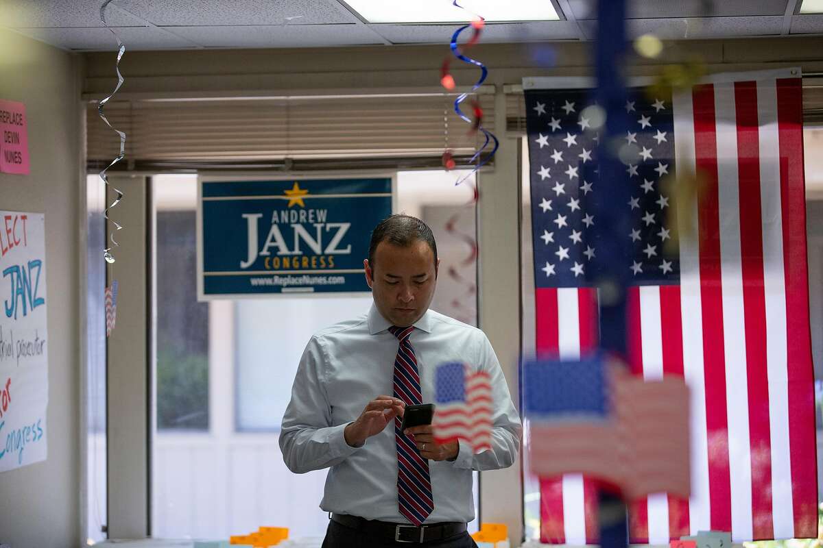 Fresno, CA - JULY 17: Fresno County Prosecutor Andrew Janz checks his phone at the Janz for Congress campaign office on July 17, 2018 in Fresno, California. Janz is hoping to unseat Nunes in the November Congressional election. (Photo by Alex Edelman/Getty Images)