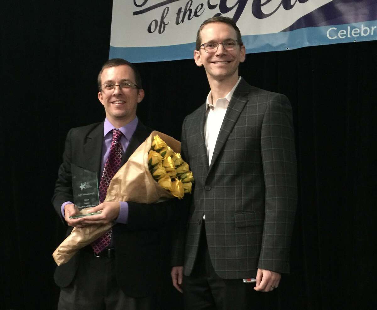 Mike Morath, Texas Commissioner of Education, right, stands next to Texas Teacher of the year, Jeff Wheatcraft of Alamo Heights Junior School.