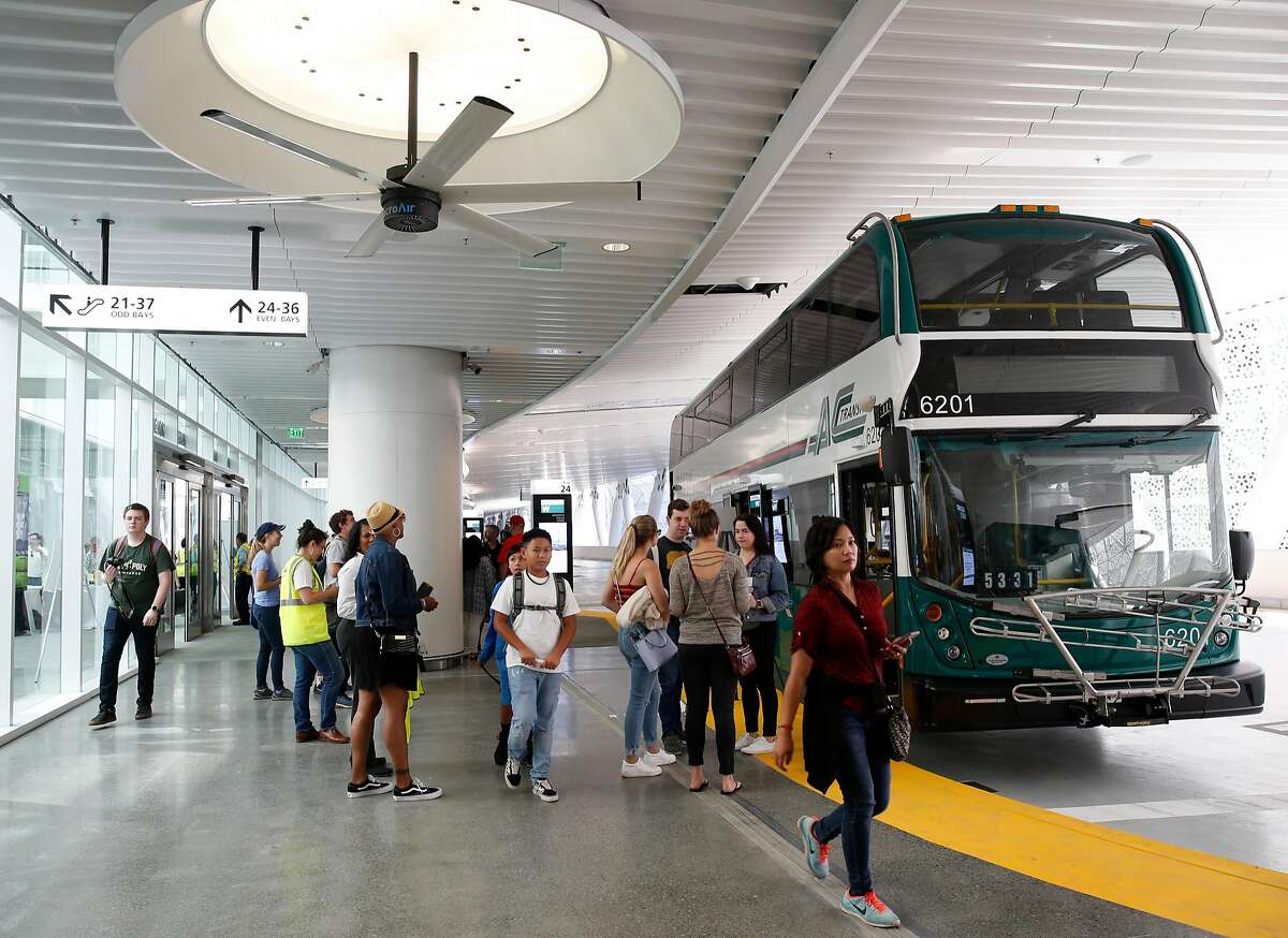 AC Transit displays a new double decker bus for visitors to tour at the grand opening of the Salesforce Transit Center in San Francisco, Calif. on Saturday, Aug. 11, 2018. Buses begin rolling through the terminal Sunday.