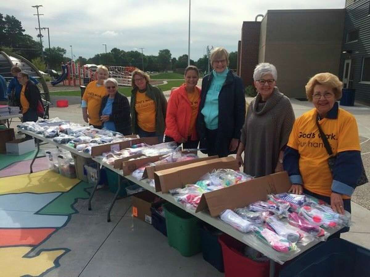 Volunteers stand at the ready to hand out supplies. (photo provided)