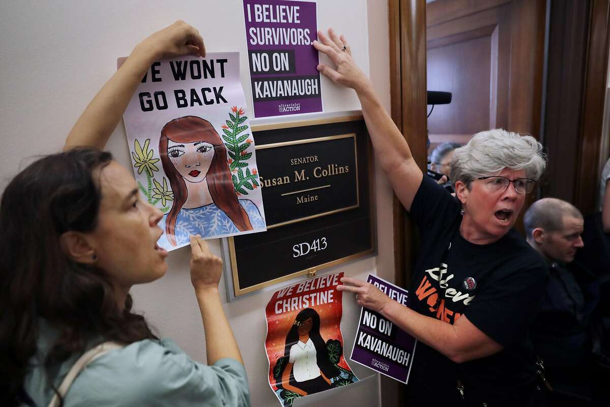 WASHINGTON, DC - SEPTEMBER 26: Dozens of protesters, including many sexual assault survivors, demonstrate against the appointment of Supreme Court nominee Judge Brett Kavanaugh outside the offices of Sen. Susan Collins (R-ME) in the Dirksen Senate Office Building on Capitol Hill September 26, 2018 in Washington, DC. More than a dozen protesters were arrested after visiting the offices of three women senators to demonstrate against the appointment of Kavanuagh, who has been accused by at least two women of sexual assault. (Photo by Chip Somodevilla/Getty Images)