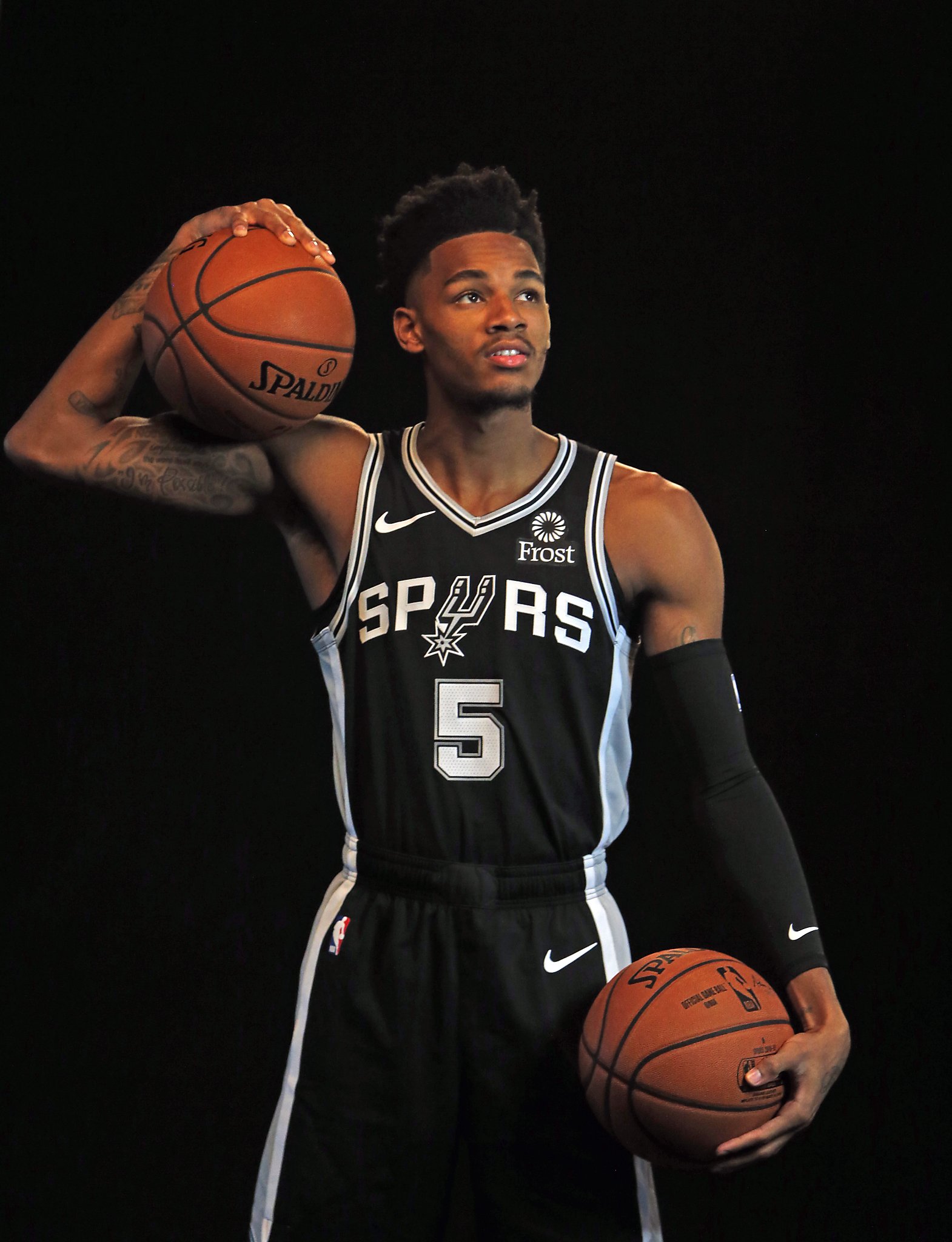 Spurs pick up options on Murray, Poeltl, White