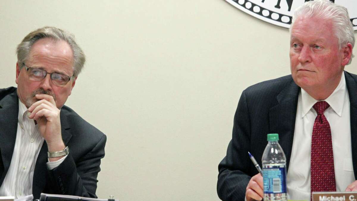 The Board of Selectmen, including Selectmen Edward Bateson, left, and First Selectman Mike Tetreau, right, want the Mill Hill Building Committee to look at the impact of traffic for three different sized schools at the site. Fairfield, CT 9/26/18