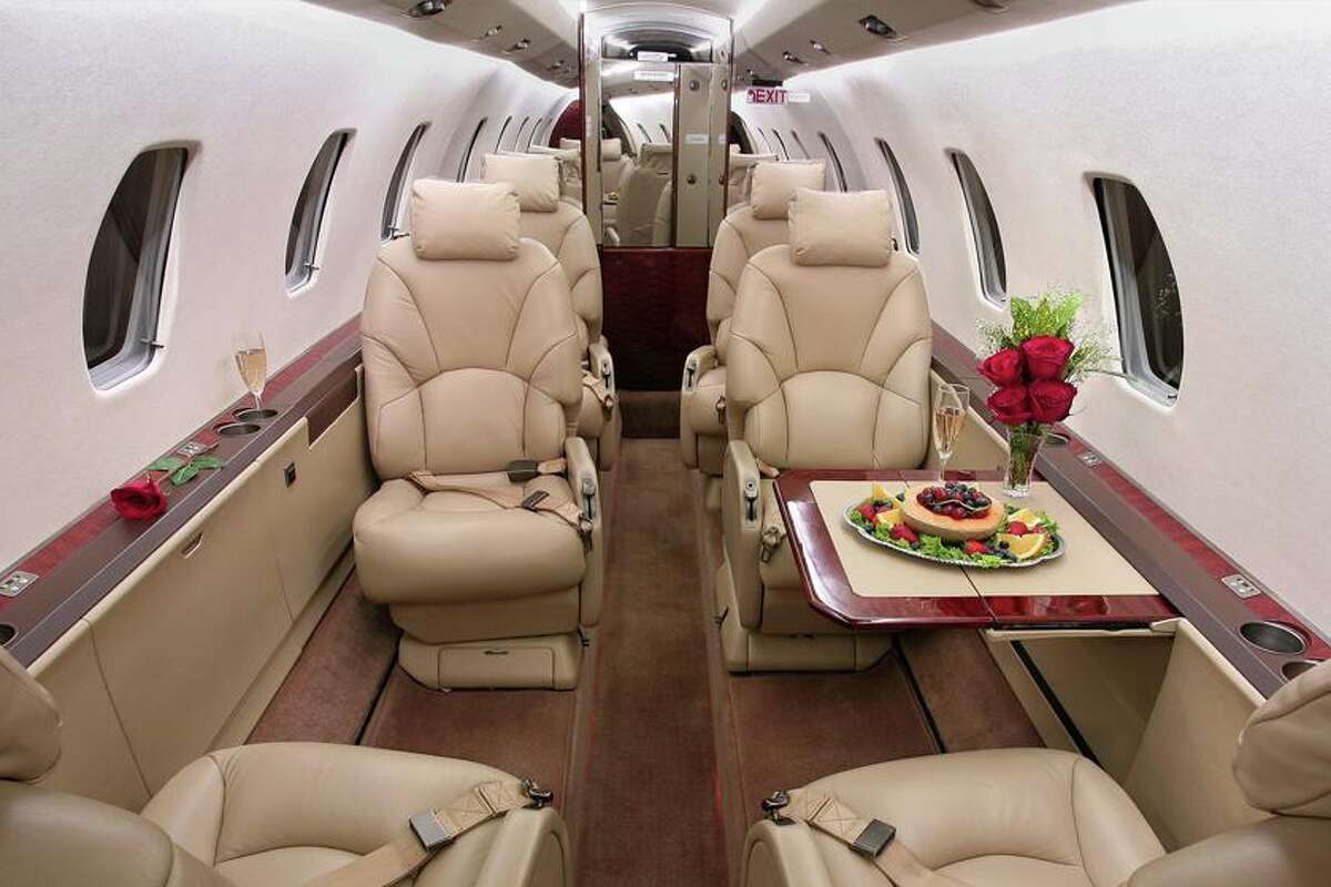 Inside a Citation XL, a medium-sized jet that holds 7-8 passengers, has a built in lavatory, and is the world's best selling private jet.