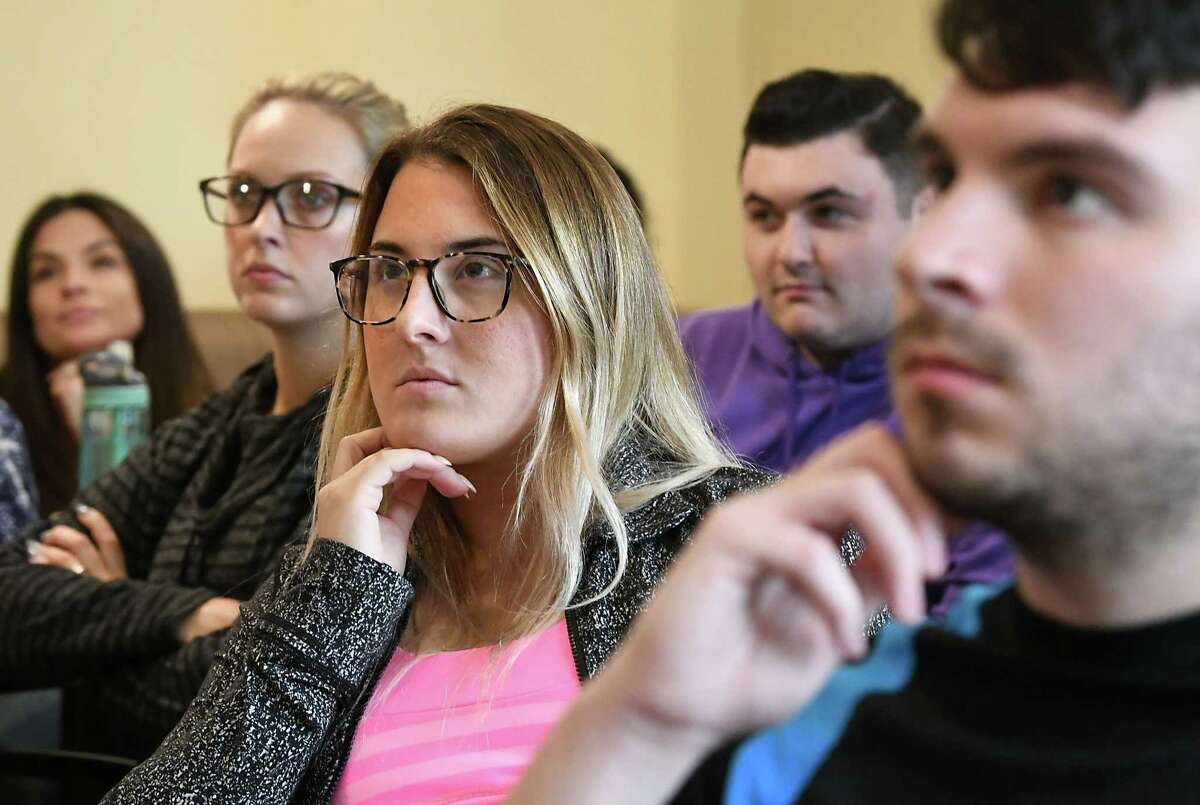 Students and faculty at Albany Law School watch Christine Blasey Ford appear in a charged hearing over Kavanaugh's nomination for the Supreme Court on Thursday, Sept. 27, 2018 in Albany, N.Y. (Lori Van Buren/Times Union)