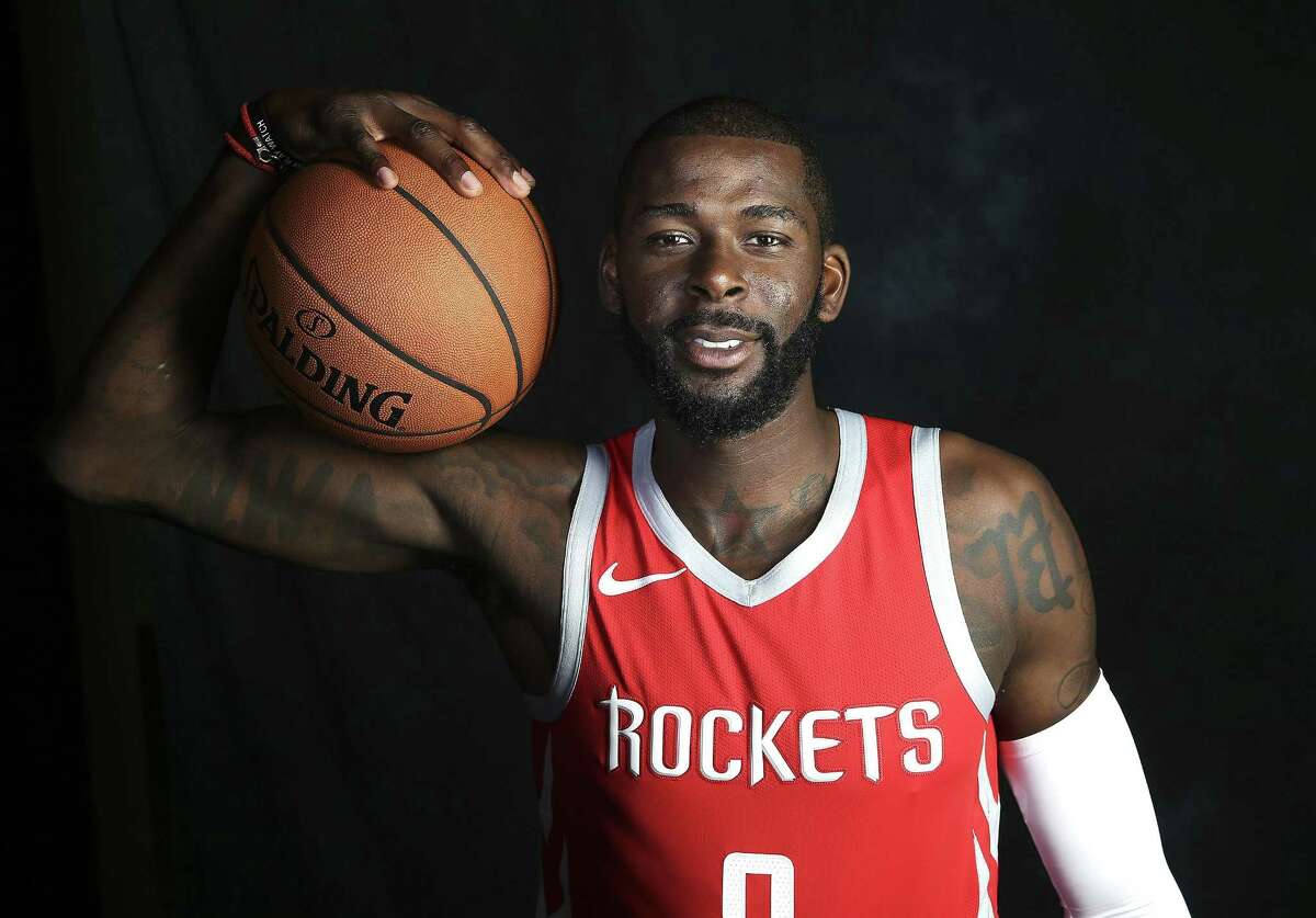 Houston Rockets forward James Ennis (8) poses for photos during Rockets Media day on Monday, Sept. 24, 2018 in Houston.
