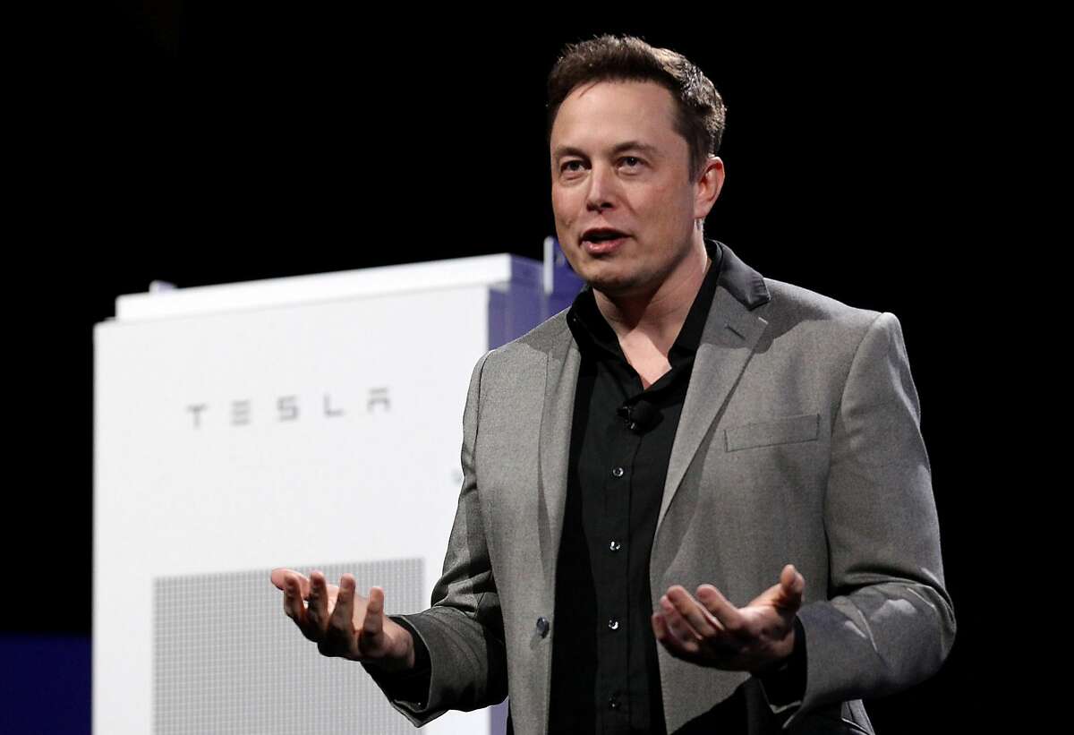 Tesla CEO Elon Musk on April 30, 2015 during an event at Tesla's plant in Hawthorne, Calif. The Justice Department is investigating whether public statements made by Musk and Tesla were misleading enough to constitute criminal fraud, the company confirmed Tuesday. (Luis Sinco/Los Angeles Times/TNS)