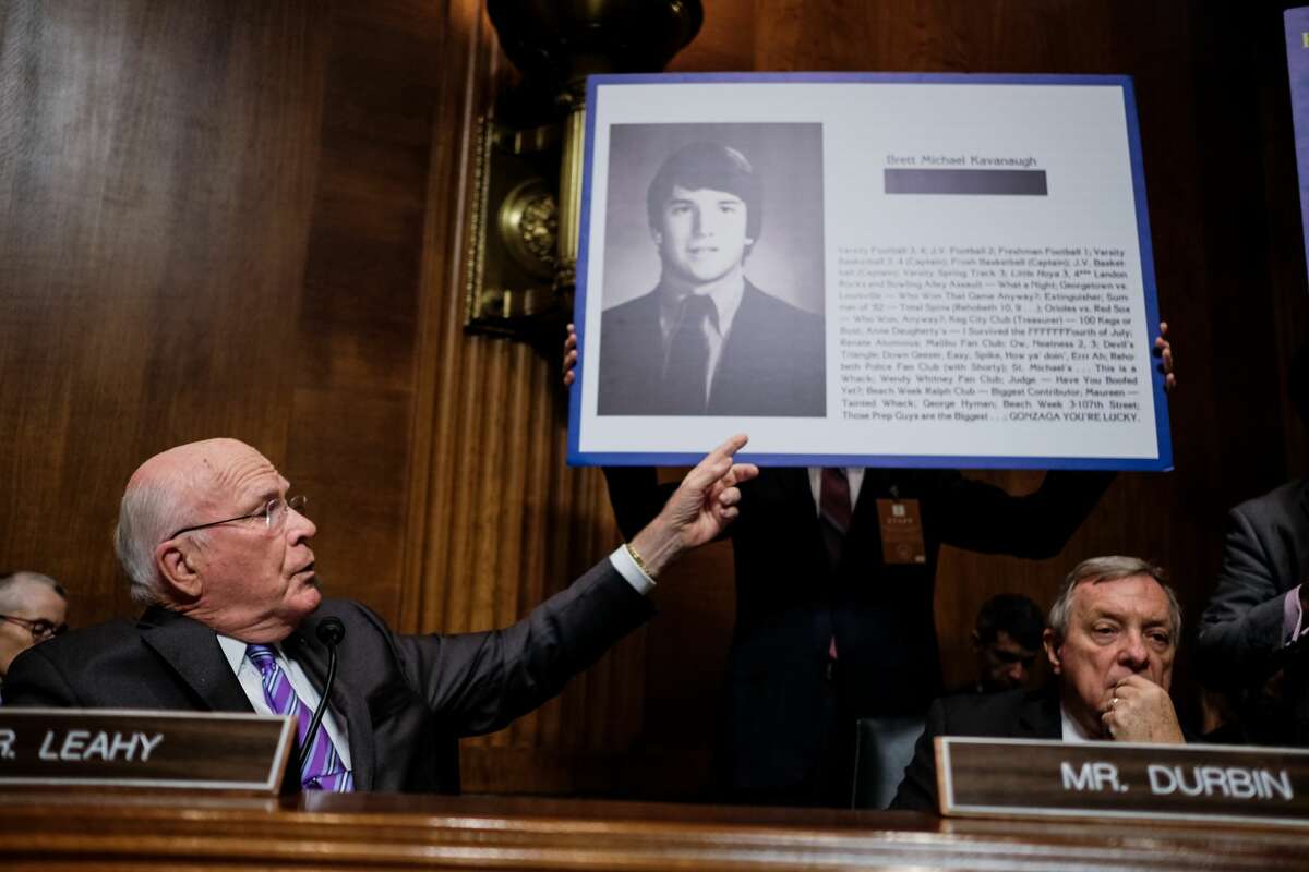 Senator Patrick Leahy points to a yearbook page from Brett Kavanaugh's yearbook. Judge Brett M. Kavanaugh testified in front of the Senate Judiciary committee regarding sexual assault allegations at the Dirksen Senate Office Building on Capitol Hill Thursday, September 27, 2018.
