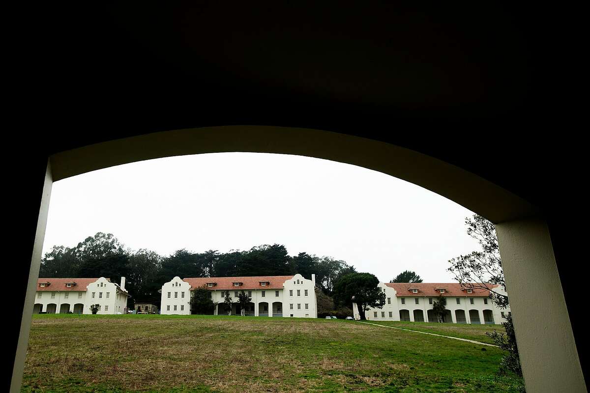 Buildings surround a lawn at Fort Scott in the Presidio on Wednesday, Jan. 17, 2018, in San Francisco. The Presidio Trust hopes to find a developer to revitalize the area.