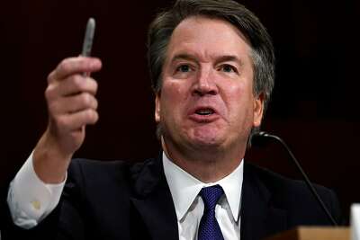 Poignant photo of women crying, scowling behind Kavanaugh ...
