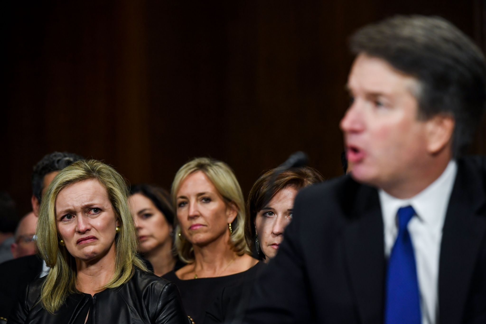 Poignant photo of women crying, scowling behind Kavanaugh ...