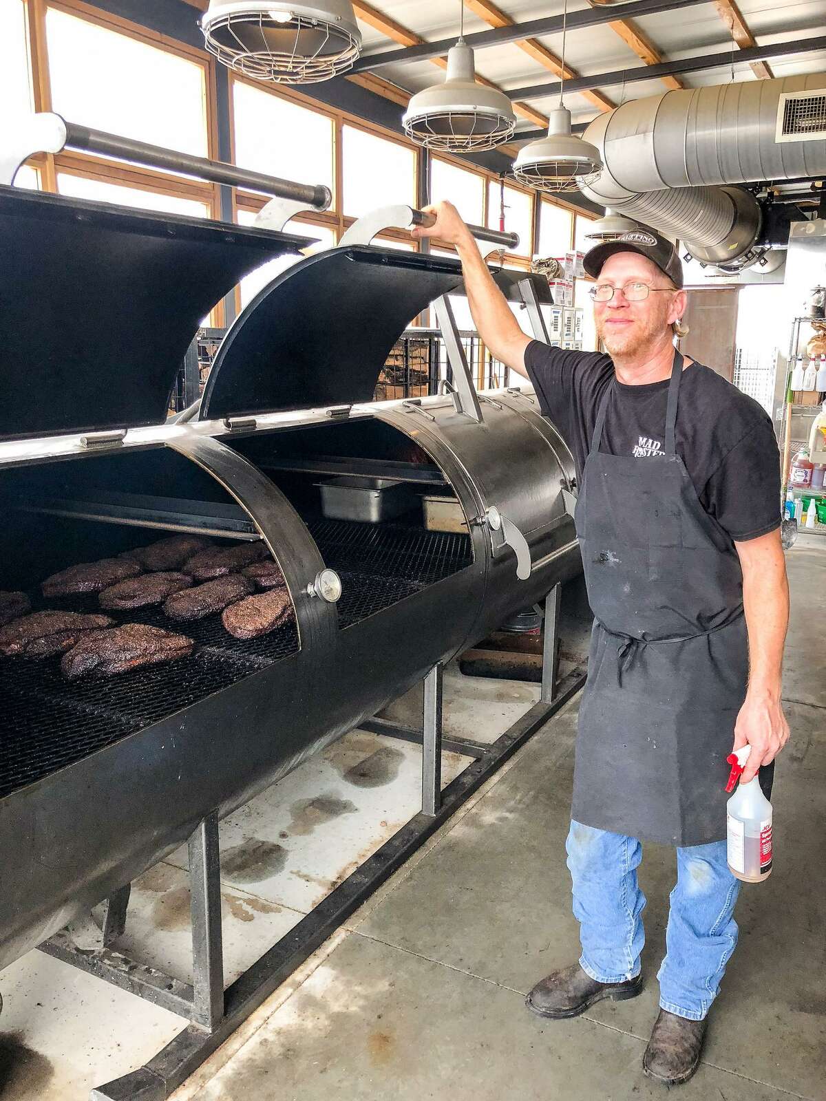 Pitmaster Bill Dumas uses four 1,000-gallon Moberg smokers at the Switch in Austin.