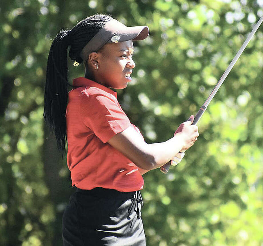 Alton’s Mariah Bolling watches her tee shot from the first hole Thursday at the Gary Bair Tournament at Oak Brook Golf Course in Edwardsville. Photo: Matthew Kamp / Hearst Illinois