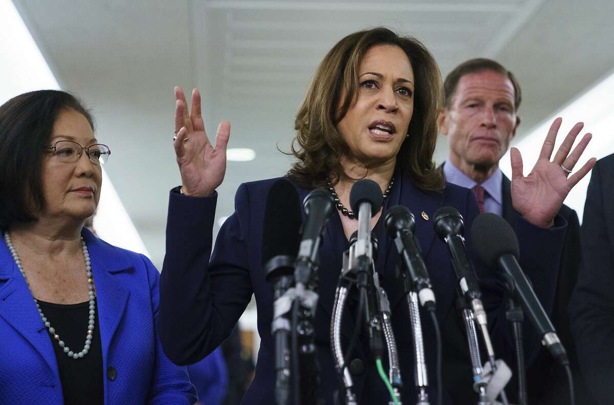 Senate Judiciary Committee member Sen. Kamala Harris, D-Calif., joined by from left, Sen. Mazie Hirono, D-Hawaii, and Sen. Richard Blumenthal, D-Conn., right, speaks to media about the Senate Judiciary Committee hearing on Supreme Court nominee Judge Brett Kavanaugh on Capitol Hill in Washington, Friday, Sept. 28, 2018. (AP Photo/Carolyn Kaster)