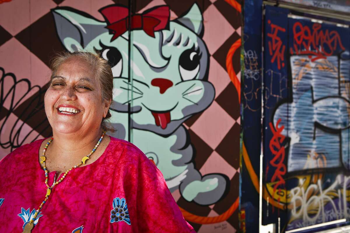 Virginia Ramos aka the Tamale Lady stands in Clarion Alley on Wednesday, July 6, 2011 in San Francisco, Calif.