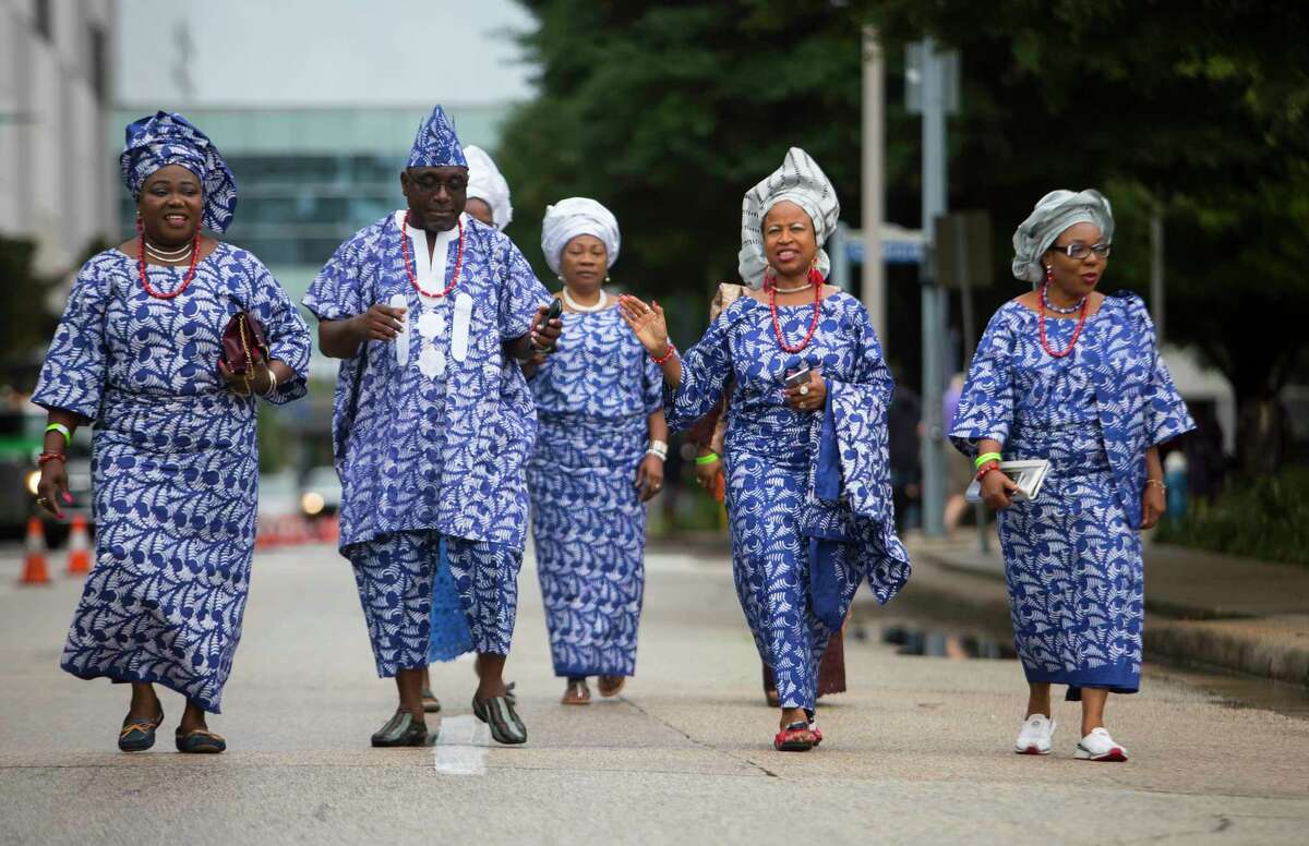 Yoruba tribe members dress and walk in unison during the second annual Nigeria Cultural Day Parade on Saturday, September 29, 2018, in downtown Houston.
