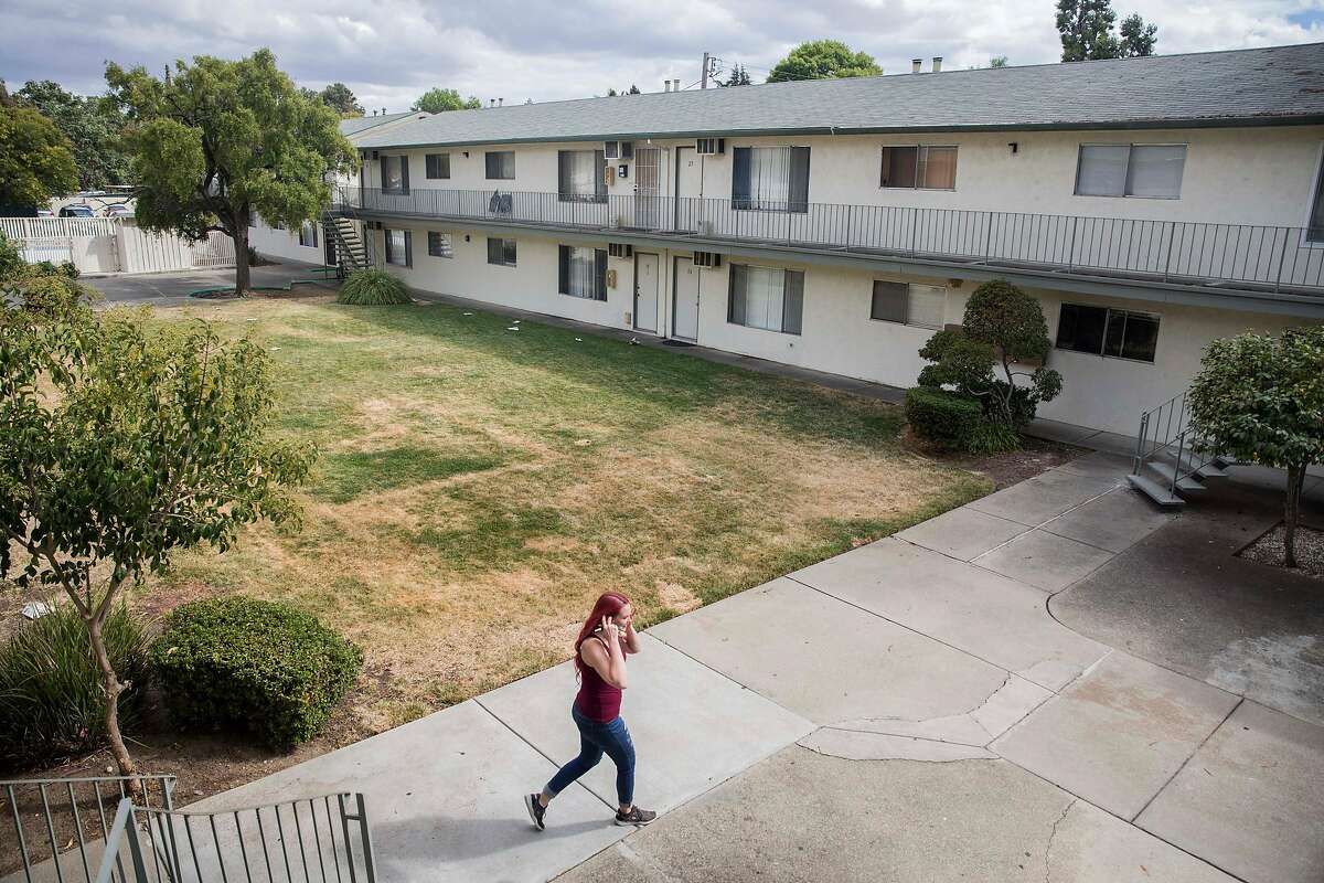 Crystal Chandler walks to her car from her apartment in Concord, Calif. Saturday, Sept. 29, 2018.