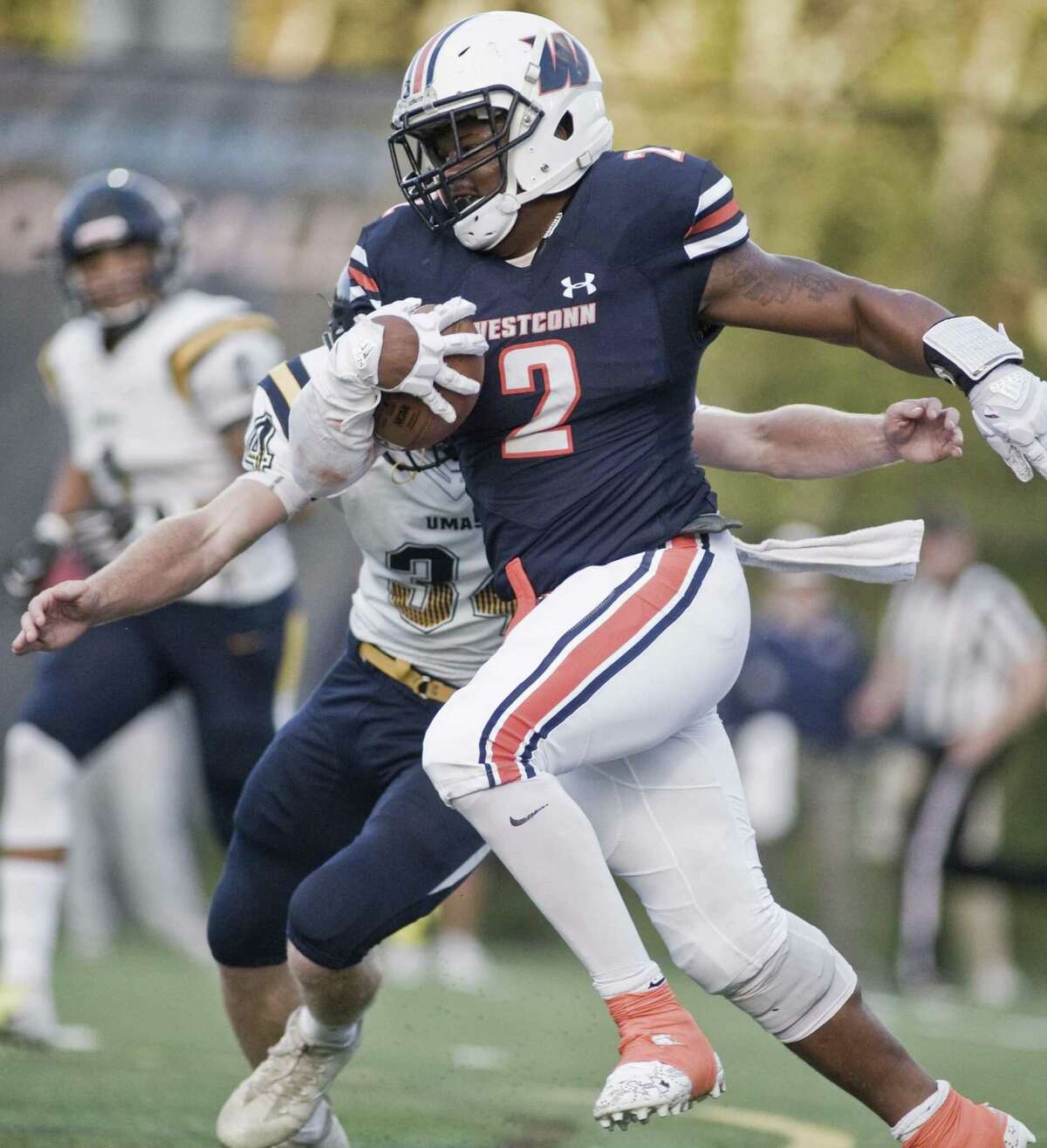 WestConn's Kyle McKinnon carries the ball in a game against UMass-Dartmouth, played at WestConn. Saturday, Sept. 29, 2018