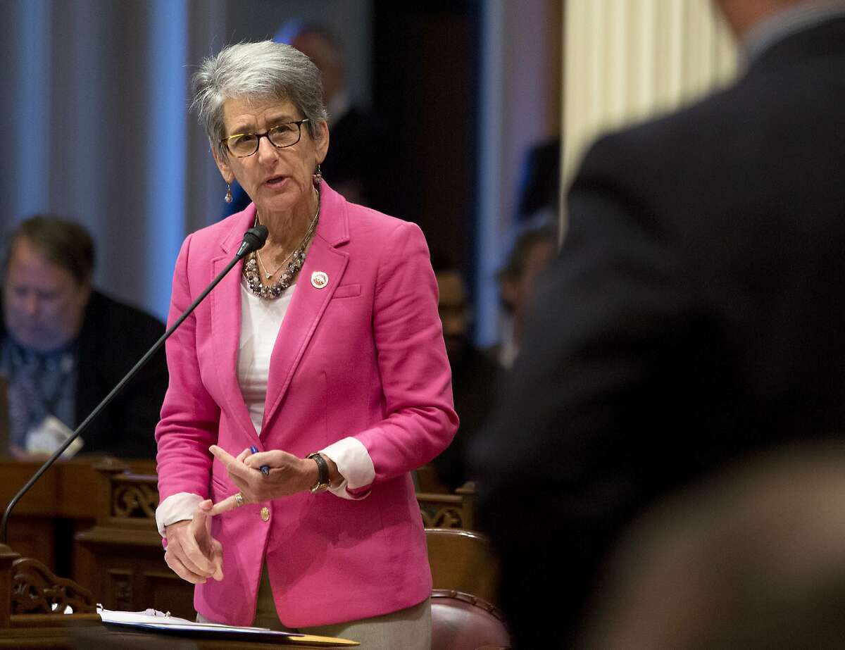 FILE - In this Thursday, June 30, 2016, file photo, State Sen. Hannah-Beth Jackson, D-Santa Barbara, responds to a question from Sen. Anthony Cannella R-Ceres, at the Capitol in Sacramento, Calif. California has become the first state to require publicly traded companies to include women on their boards of directors by 2020, according to a law signed Sunday by Gov. Jerry Brown. Having more women on boards will make companies more successful, says state Sen. Hannah-Beth Jackson, who authored the bill SB826. She believes having more women in power could also help reduce sexual assault and harassment in the workplace. (AP Photo/Rich Pedroncelli, File)