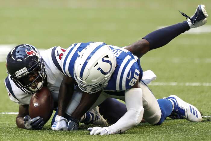 TV Analyst Booger McFarland looks on the sideline during an NFL