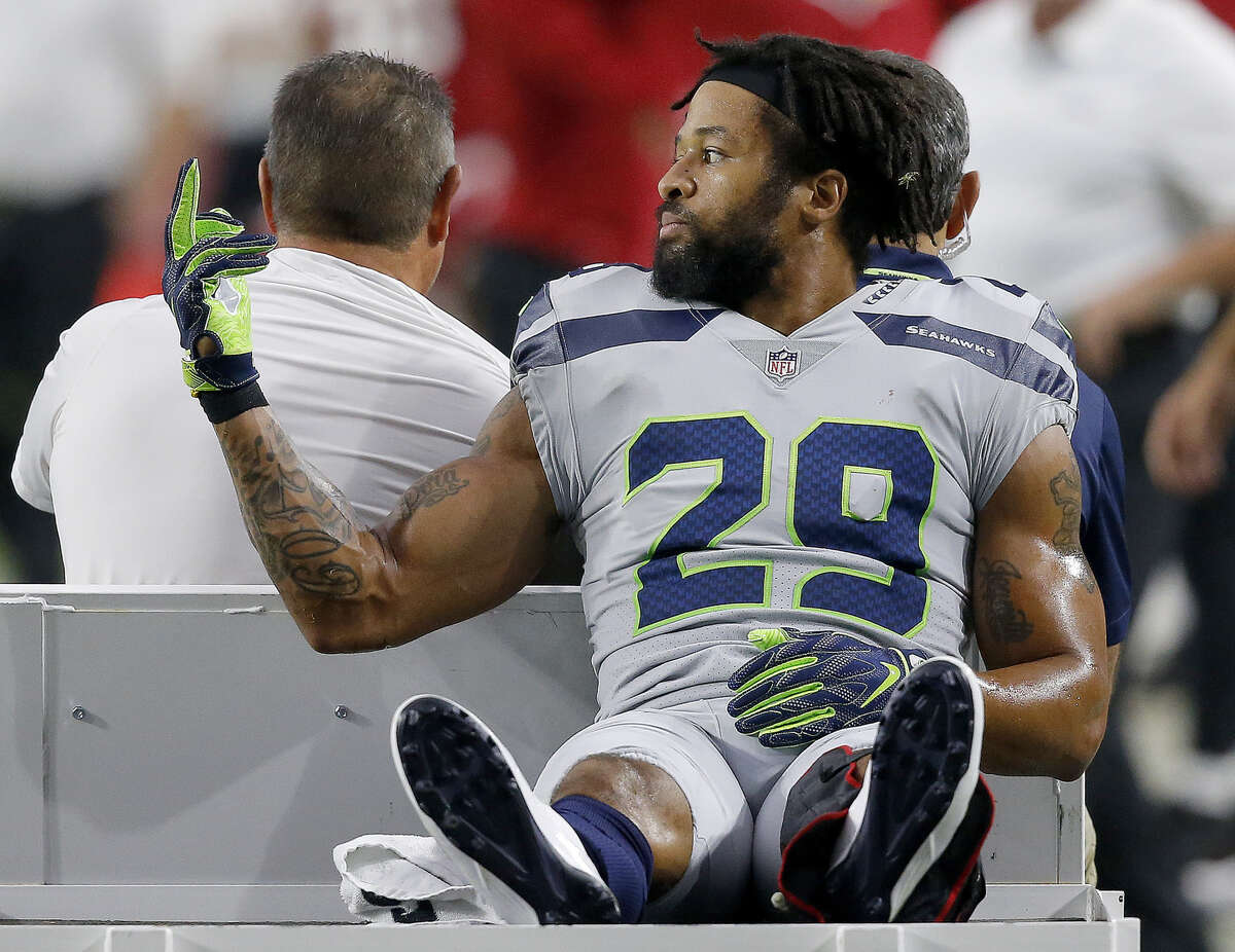 DID EARL THOMAS PLAY HIS LAST GAME AS A SEAHAWK?  The All-Pro safety sustained a serious injury Sunday illustrating, perfectly, why he initiated a contract holdout in the first place.  Thomas fractured his leg in the fourth quarter while attempting to break up a touchdown pass in the end zone. The six-time Pro Bowler is expected to miss the rest of the season.  "That was a very emotional moment," safety Bradley McDougald said. "The guys huddled around him, we grabbed hands, we said a prayer for him. I told him I loved him and it was time to go back to work. As emotional as it was, at that point in the game, we needed to make a play." Thomas didn’t report to the Seahawks throughout the offseason, training camp and preseason hoping to get a new contract with more guarantees (He’s in the final season of a four-year, $40 million contract he signed in 2014)  -- either from Seattle or elsewhere. Instead, the Seahawks never budged and Thomas was never dealt. Now he’ll look toward the offseason as a 29-year-old free agent with an injury history. Despite his status as an elite free safety, the optics aren’t in Thomas’ favor.  As he was carted off the field, Thomas was captured pointing his middle finger in the direction of the Seahawks’ sideline. It’s not clear who it was intended for, but it wouldn’t surprise anyone if it was meant for the Seahawks’ front office. "If I was him, I'd be pissed off," linebacker Bobby Wagner...