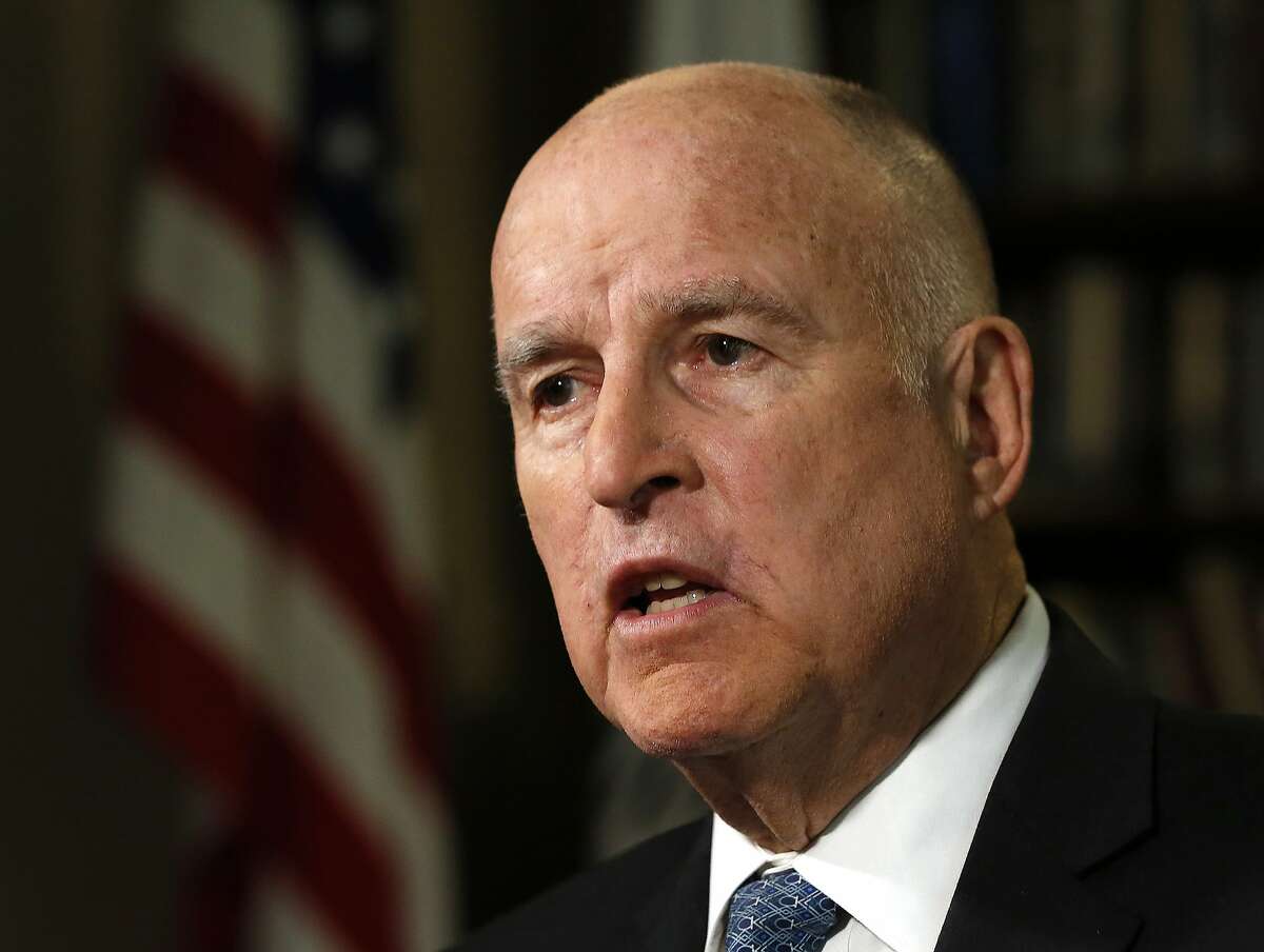 FILE - In this Sept. 10, 2018 file photo, Gov. Jerry Brown speaks during an interview with The Associated Press, in Sacramento, Calif. California has become the first state to require publicly traded companies to include women on their boards of directors by 2020, according to a law signed Sunday, Sept. 30, 2018, by Gov. Jerry Brown.(AP Photo/Rich Pedroncelli, File)