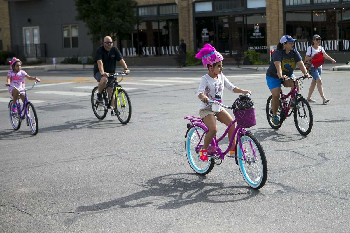 Bicyclists ride on Broadway north of downtown in San Antonio during Siclovia, a biannual event put on by the YMCA of Greater San Antonio on Sept. 30, 2018. With the streets closed to traffic, people were free to walk, ride bikes or play while getting some exercise.