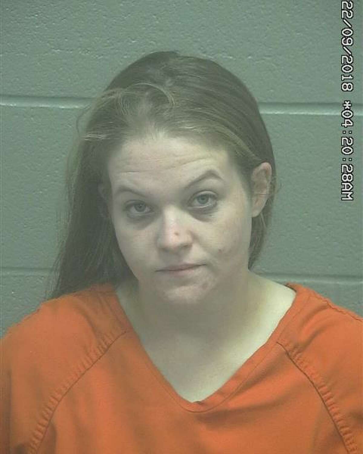 Marissa Kay Smith, 28, was arrested Sept. 21 after she allegedly fired a rifle near a man, according to court documents.