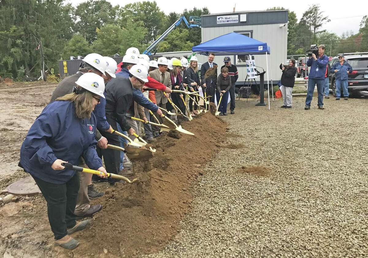 East Hampton broke ground for the new town hall/police station Friday afternoon. About 80 people attended. The 33,000-square-foot, two-story building will be built on a 5.4-acre parcel of plan in the Edgewater Hills mixed-use development.