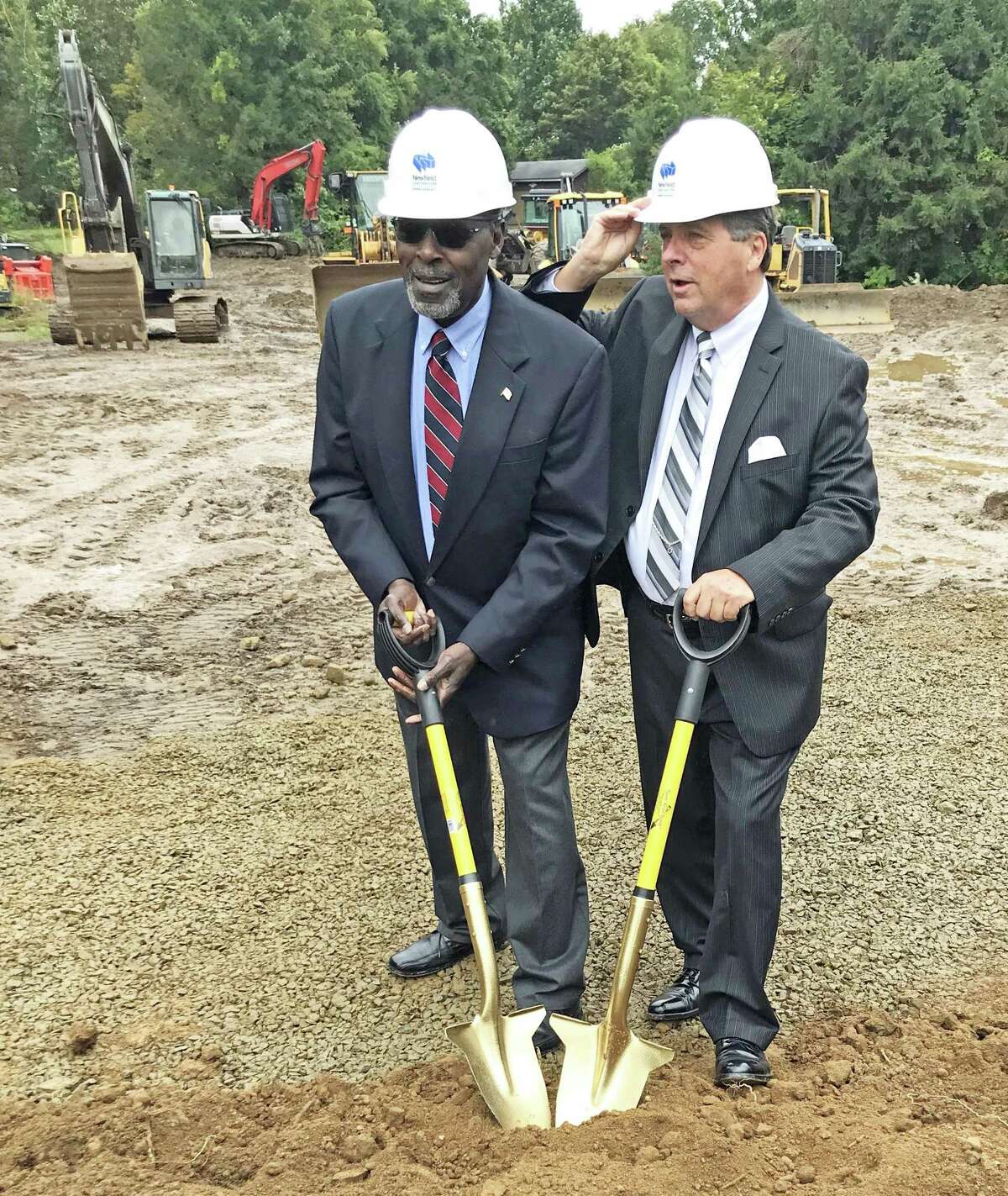 East Hampton broke ground for the new town hall/police station Friday afternoon. A crowd of some 80 people, the majority of them town employees and police officers, attended.The 33,000-square-foot, two-story building will be built on a 5.4-acre parcel of plan in the Edgewater Hills mixed-use development.