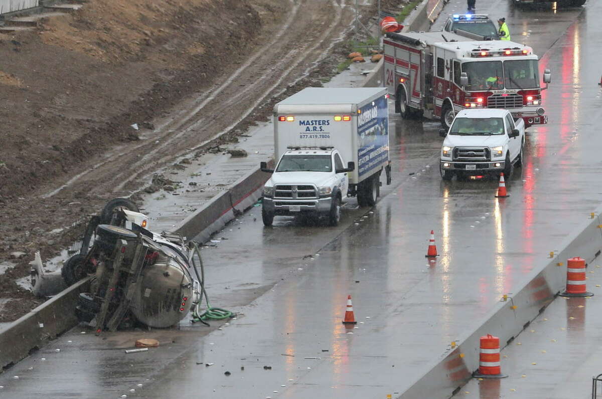 Overturned truck shuts down South Freeway near South Loop