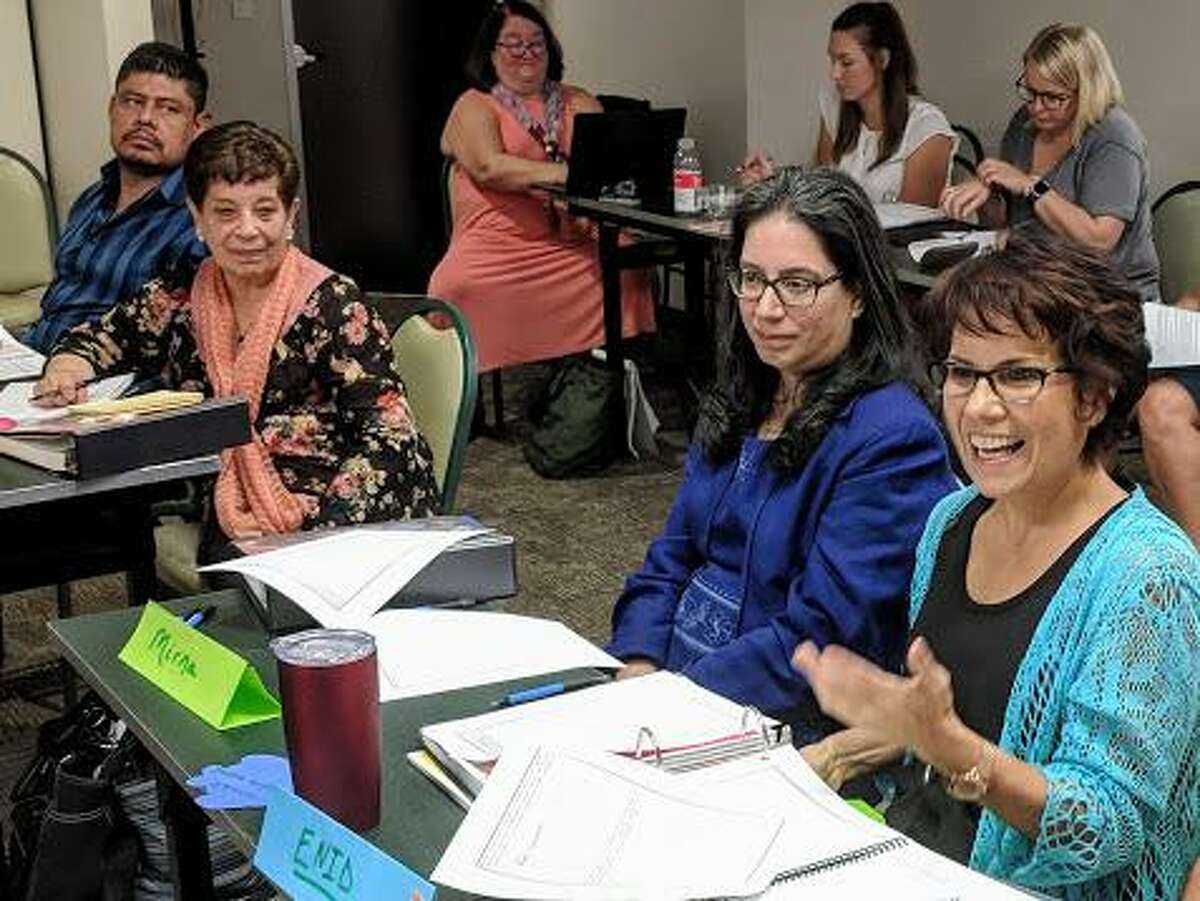 Faith & Diabetes participants Victor A. Contreras, Beatriz Schriber, Mirna Puesan and Enid Larriu learn how to lead six-week Diabetes Self-Management Education & Support programs in their respective faith communities.