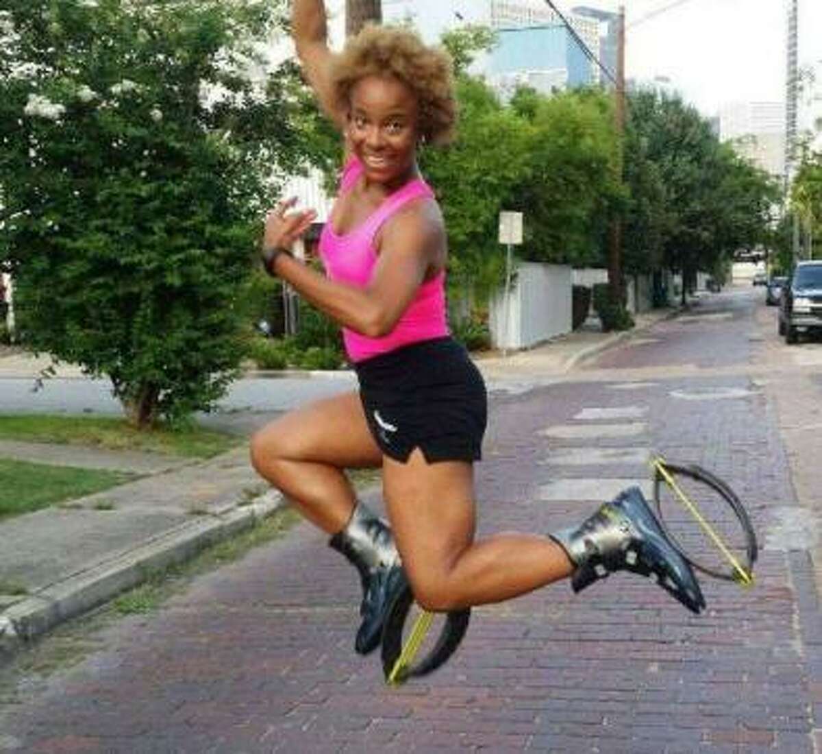 Mia Trevillion-Barney, instructor and founder of Groove Bounce Fun, uses Kangoo Jump boots. She's also a breast cancer survivor.