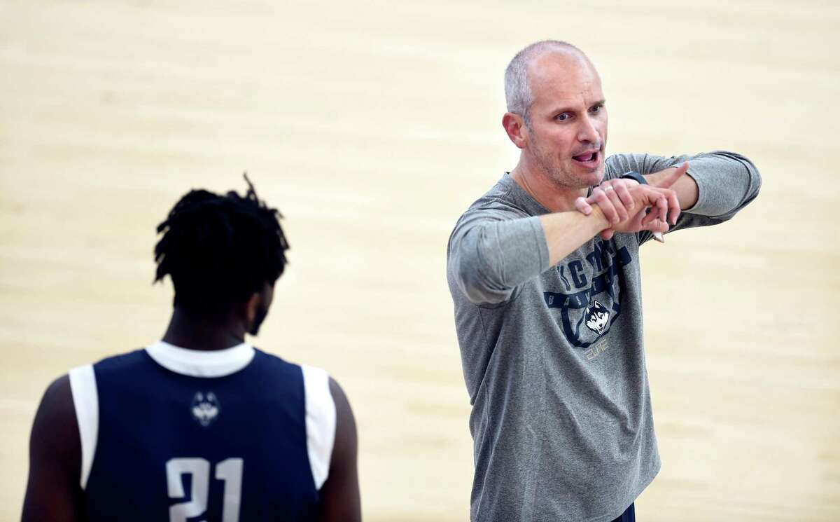 UConn men’s basketball head coach Dan Hurley talks to his players during a recent practice.