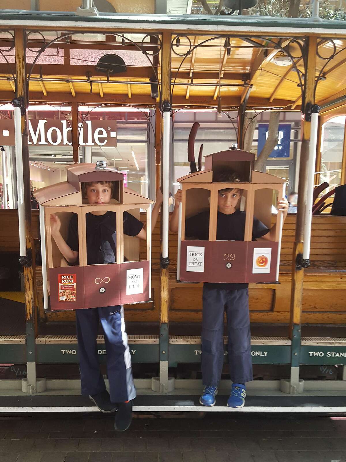 Milo and Solomon Sperry of San Francisco dress as a different city landmark every year. Here they are as a pair of cable cars in 2015.
