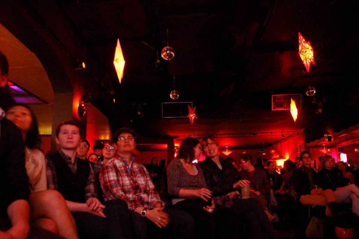 A crowd listens to readers during Sister Spit, a queer spoken word festival, at Elbo Room in San Francisco, Calif., on Monday, March 21, 2011.