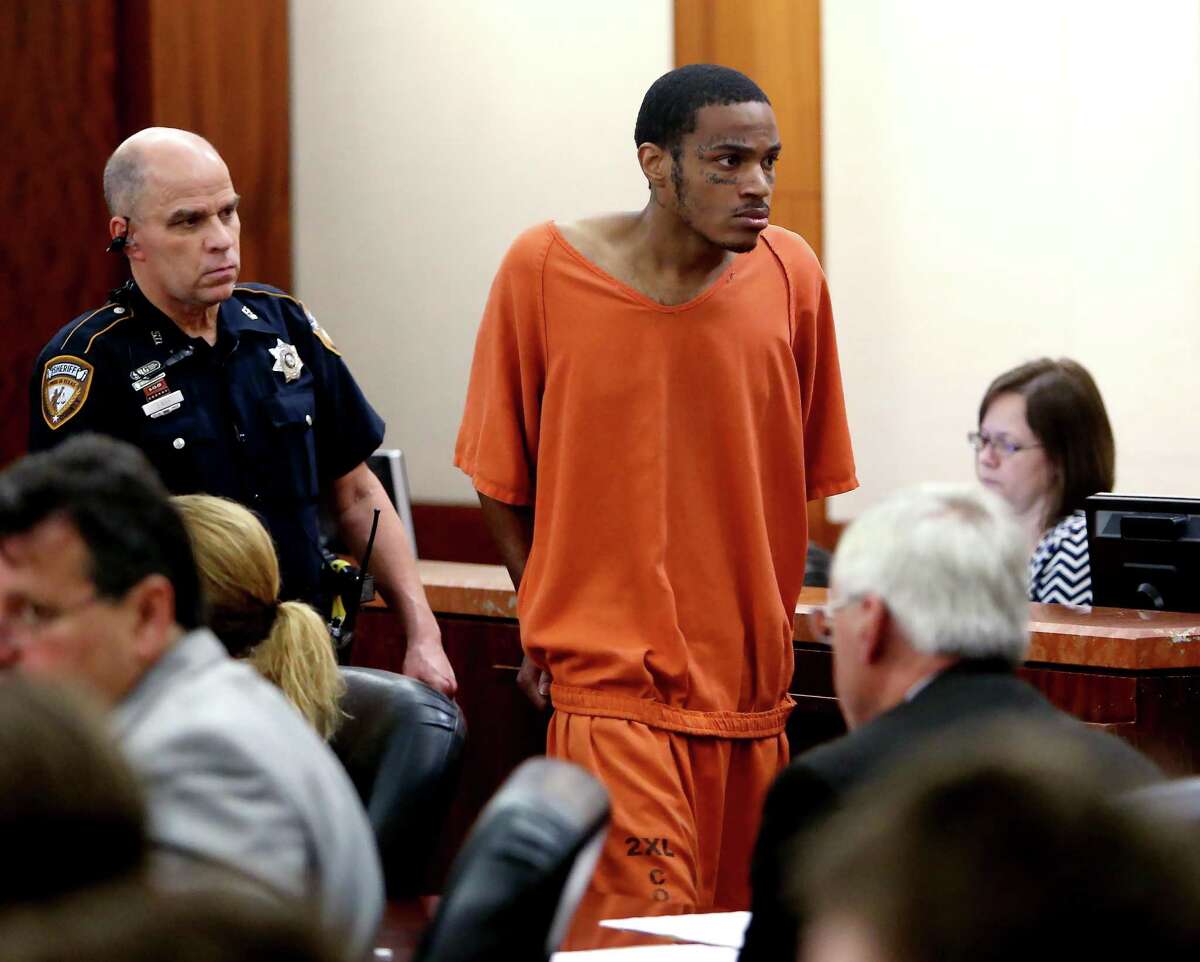 Kiara Taylor, 26, of Houston, is charged with capital murder in connection with the shooting death of Peter Mielke, an employee at Reginelli's Pizzeria, during a first appearance in the 209th District Criminal Court at the Harris County Courthouse Thursday, March 10, 2016, in Houston, Texas. ( Gary Coronado / Houston Chronicle )