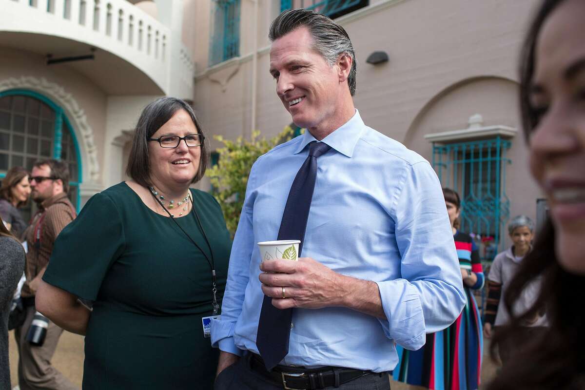 Democratic gubernatorial candidate Gavin Newsom with September Jarrett, executive director of San Francisco Office of Early Care & Education, stand together at the preschool playground during a tour at Felton Family Developmental Center. Tuesday, October 2, 2018 in San Francisco Calif.