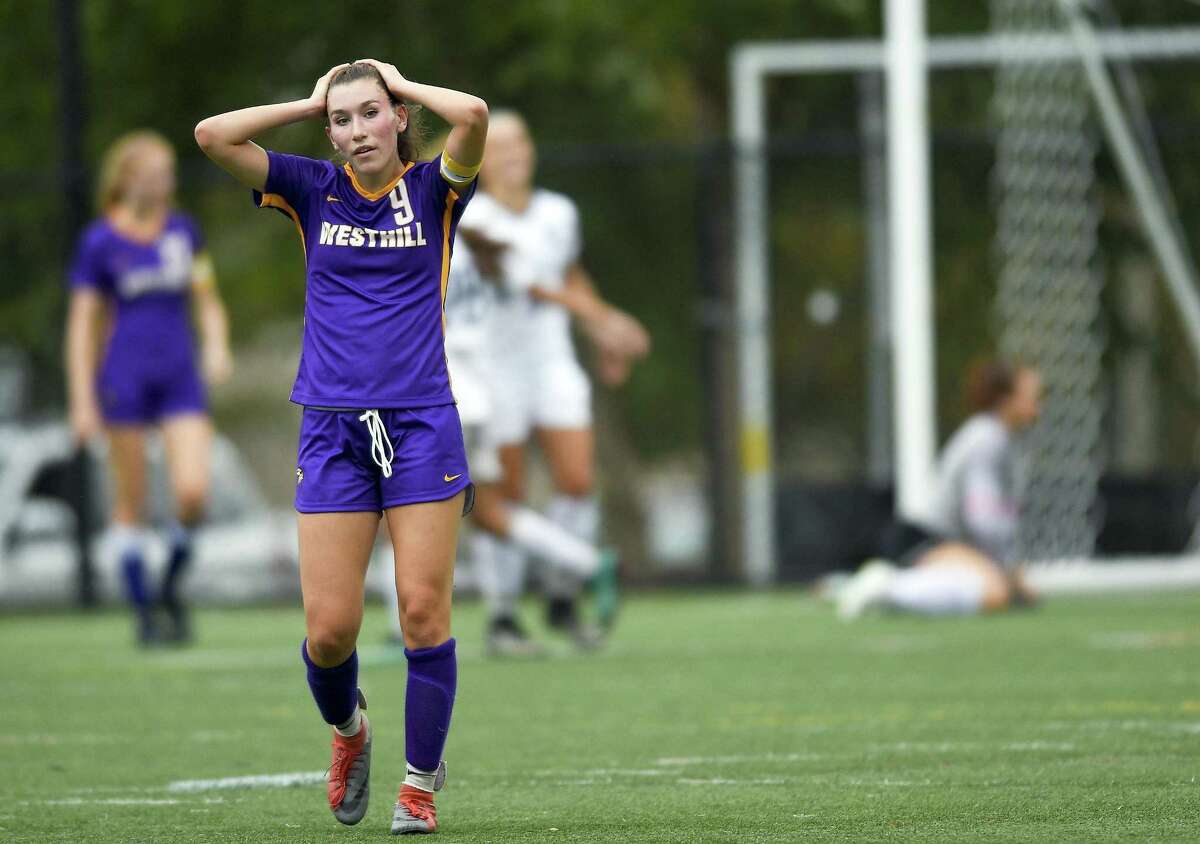 Westhill's Corinne Dente (9) reacts after Staples Ava Simunovic scored on a cornerkick in the first half of an FCIAC girls soccer game on Oct. 2, 2018 in Stamford, Connecticut. Staples defeated Westhill 4-1.