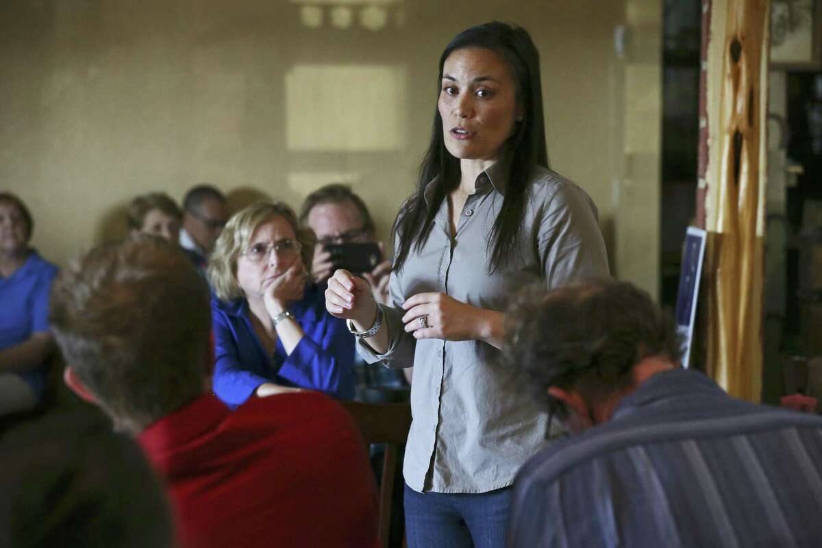 Democratic nominee for Texas' U.S. Congressional District 23 Gina Ortiz Jones addresses the crowd during a meet and greet reception at El Charro Restaurant in Hondo, Texas, Wednesday, August 1, 2018. Ortiz Jones is running against Republican incumbent U.S. Rep. Will Hurd in the November 6 general elections.