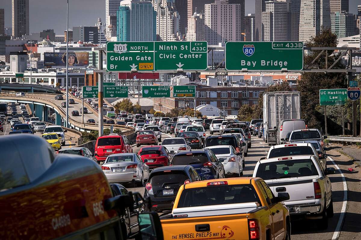 Vehicles in traffic travel along Highway 101 heading eastbound in San Francisco, in San Francisco, California, U.S., on Wednesday, May 9, 2018. Last month, the Environmental Protection Agency and the National Highway Traffic Safety Administration proposed freezing fuel efficiency requirements for autos at 37 miles per gallon in 2020, instead of letting them rise to 47 mpg by 2025 under Obama-era regulations. Photographer: David Paul Morris/Bloomberg