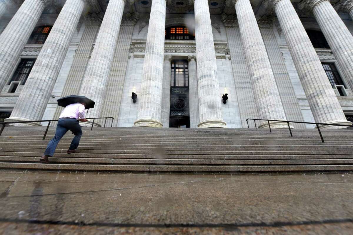 Persistent rainfall made life difficult for lunchtime foragers outside the State Education Building on Tuesday, Oct. 2, 2018, on Washington Avenue in Albany, N.Y. (Will Waldron/Times Union)