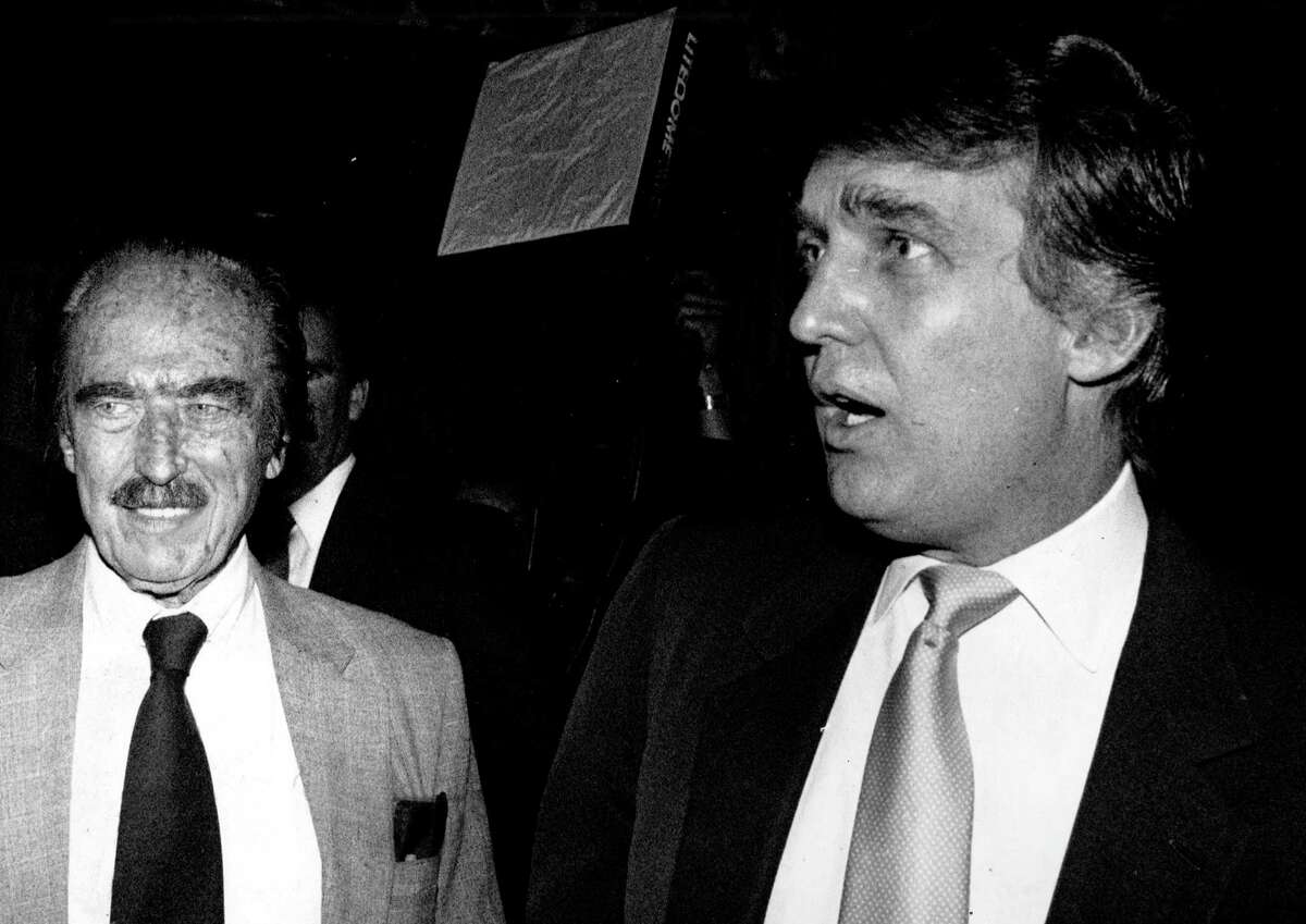UNITED STATES - JULY 22: Donald Trump and his father, Fred, at a championship dinner on the evening of the Mike Tyson-Williams championship fight in Atlantic City, N.J. (Photo by Dan Farrell/NY Daily News Archive via Getty Images)