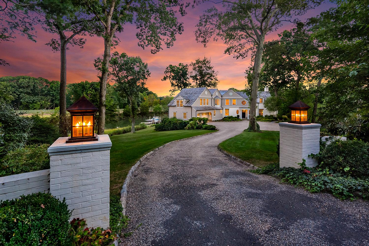 On the Market / Darien home is surrounded by water with its own dock