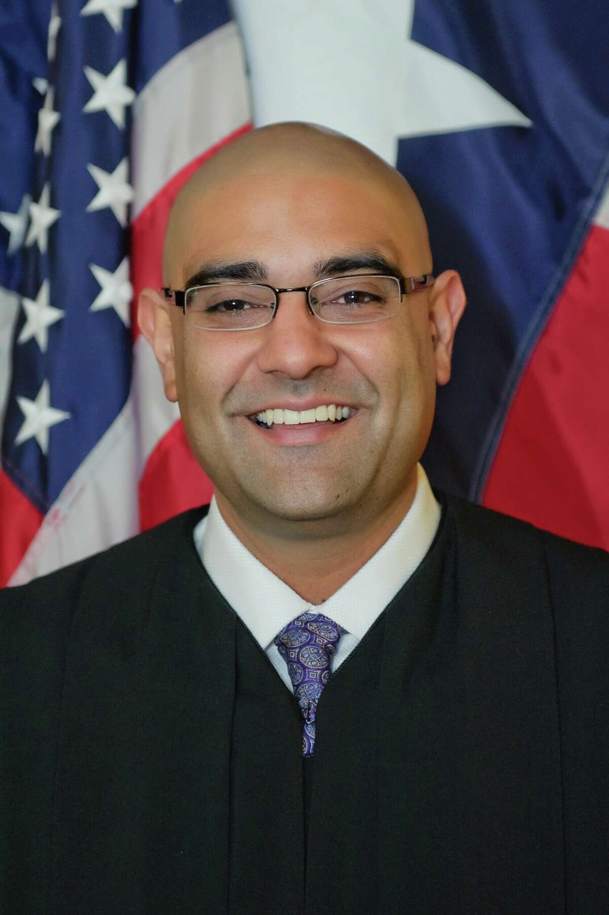 R.K. Sandill, (D), candidate for Supreme Court, Place 4.