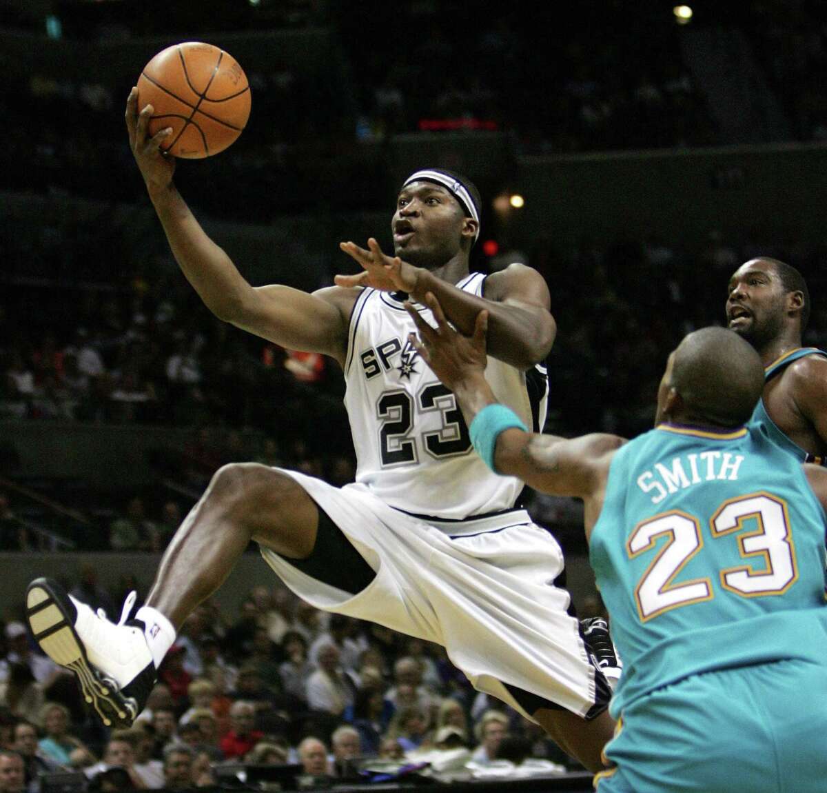 Former San Antonio Spurs guard Devin Brown (23) played in what is now the Spurs Youth Basketball League (SYBL), which serves about 10,000 South Texas kids annually and is geared toward low-income families and communities,