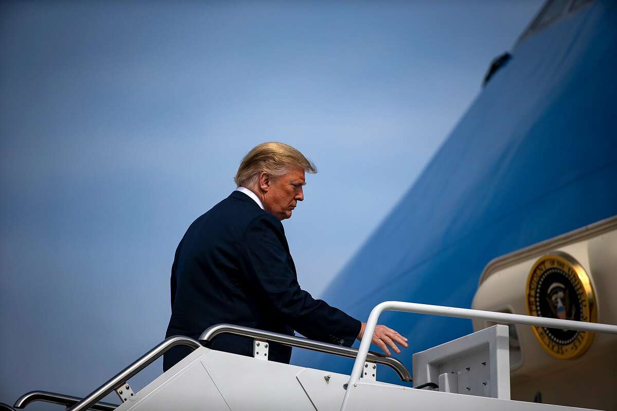President Donald Trump boards Air Force One at Joint Base Andrews in Maryland, Oct. 2, 2018. Trump on Wednesday criticized a New York Times investigation into his and his family�s use of dubious tax schemes over the years and the origins of his own wealth, calling the article an �old, boring and often told hit piece.� (Al Drago/The New York Times)